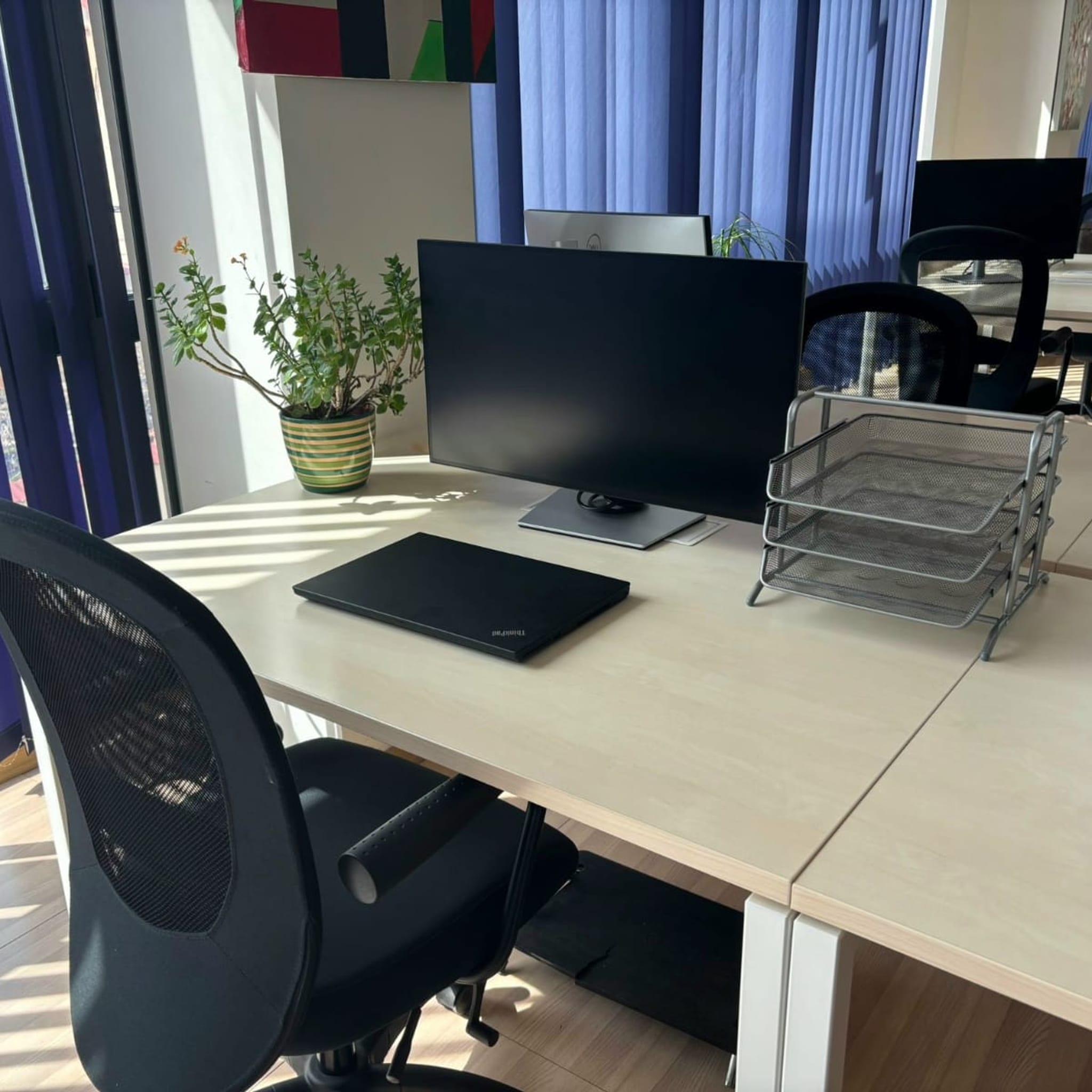 Open coworking space with professionals working